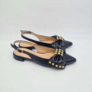 Chanel flat con fiocco e borchiette